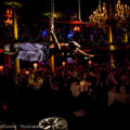 Patrons of both genders howl and swoon at the sight of aerialist Stephen Williams in chains