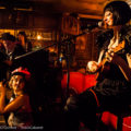 Patrons at The George Tavern enjoy an intimate number by EastEnd Cabaret on ukulele and musical saw