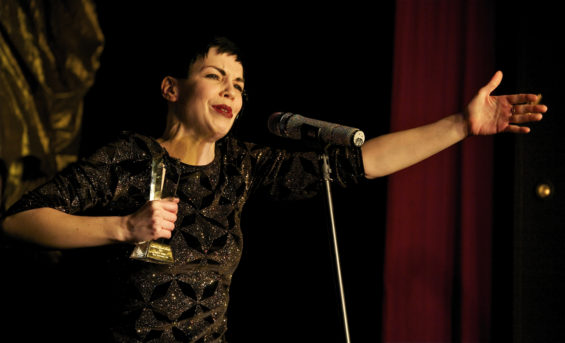 Keep your friends close, your award closer: Laurie Hagen tops a great year by picking up the Best Burlesque Act trophy.