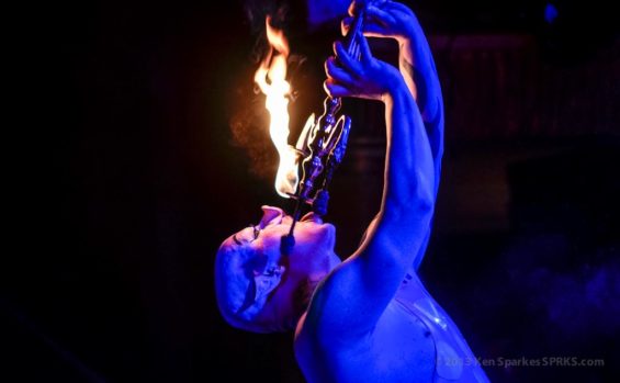 Aerialist and firebreather Chrisalys performing his Pig From Hell act at Black Cat Cabaret.